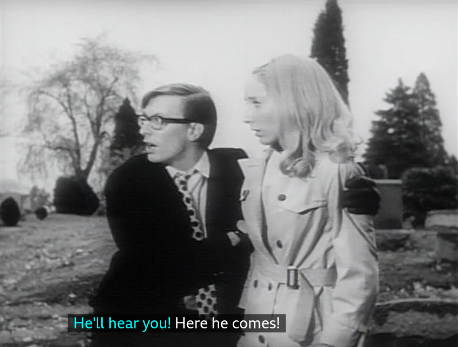 A still from Night of the Living Dead that shows Johnny talking to his sister, Barbra, he has his arms around her and they are both looking at something off-screen. «He'll hear you!» says Barbra to her brother, «Here he comes!» Johnny says in return to his scared sister.