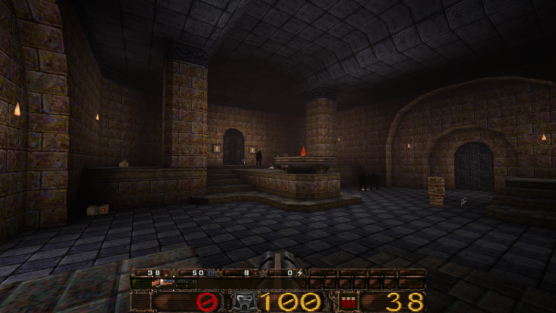 A large brick room with dead monsters in.